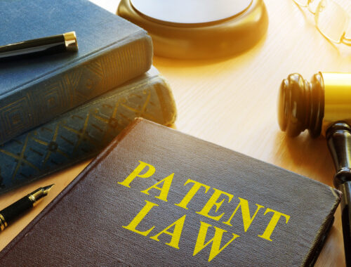 Book about Patent Law and gavel. Copyright concept.